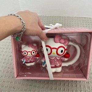 NIB hello kitty mug and figurine set